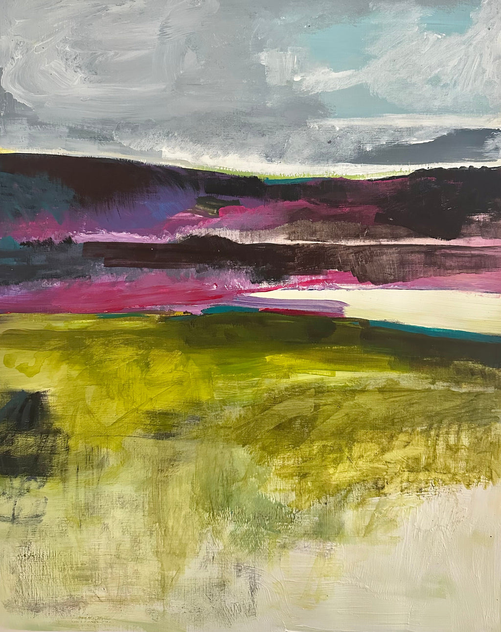An abstract landscape painting on textured paper, featuring a gray and white sky, dark purple and black hills, a magenta horizon, and a bright yellow-green field below.